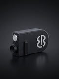 Easi Breezi helmet air filter unit, three-quarter view on a dark studio background