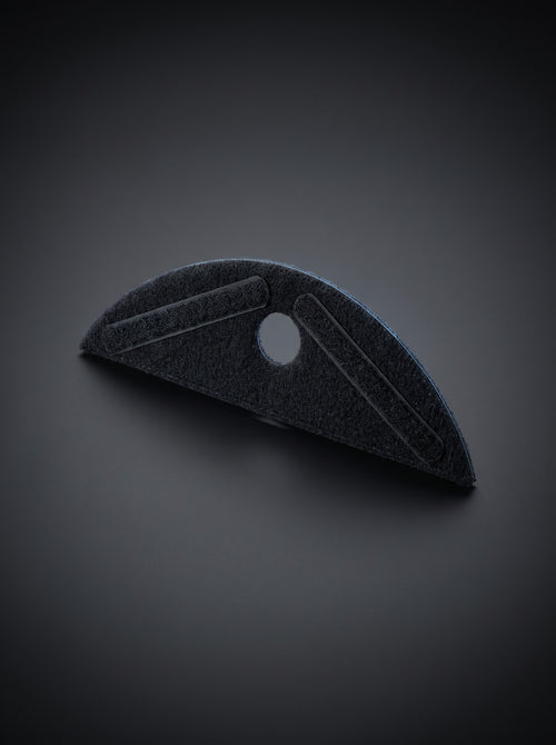 Easi Breezi universal helmet attachment, a black felt crescent with hook-and-loop strips and a centre air hole