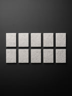 Ten Easi Breezi H11 HEPA replacement filter pads laid out in two rows of five