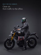 Commuter in a suit on a motorcycle with the Easi Breezi air hose connected to his helmet
