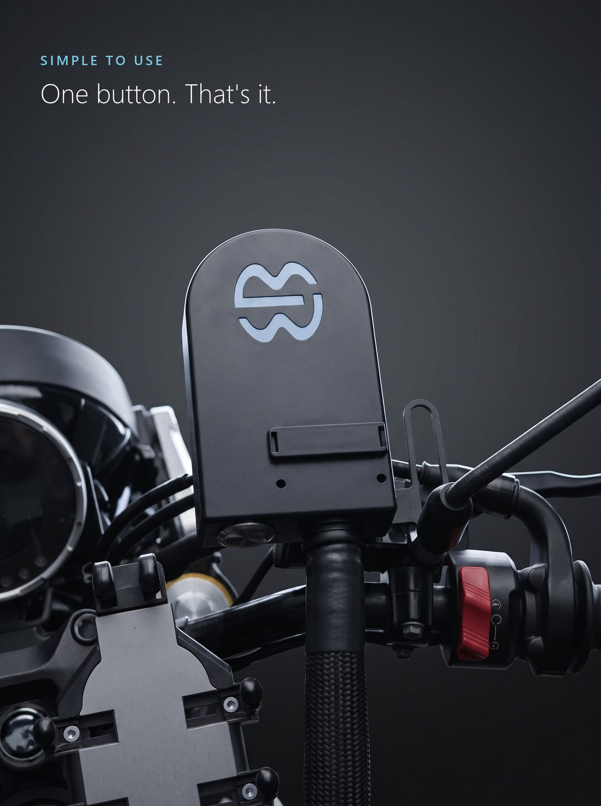 Top-down view of the Easi Breezi unit with its single power button on a motorcycle handlebar
