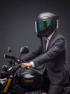 Close-up of the Easi Breezi air hose running from the handlebar to the rider's helmet chin bar